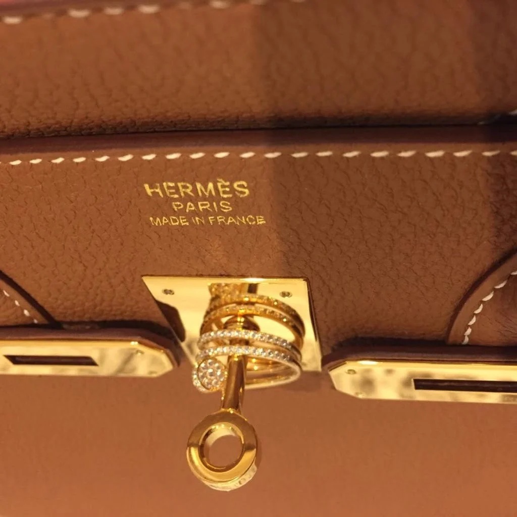 Before You Buy: The Modern Woman’s Guide to Handbag Authenticity & Value three gold hardware